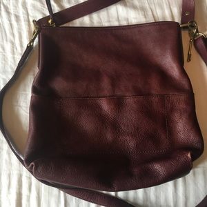 Fossil large cross body wine colored purse